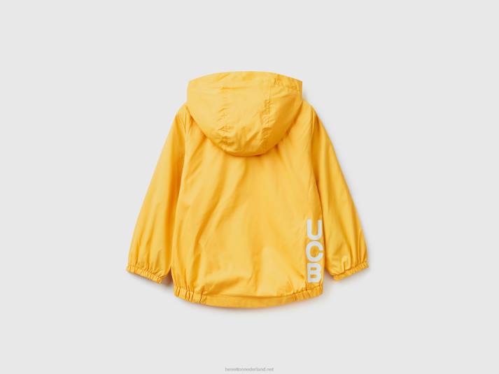 kinderen Benetton lichte jas met capuchon geel 4R622110