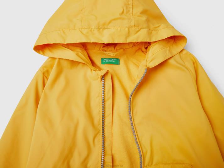 kinderen Benetton lichte jas met capuchon geel 4R625009