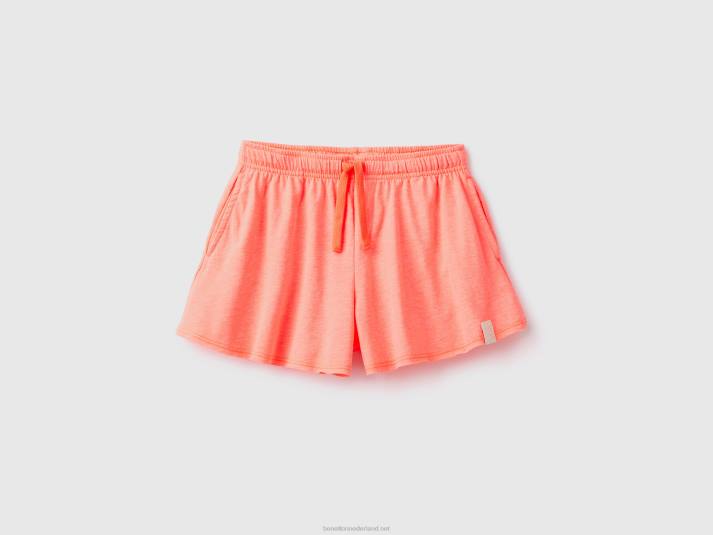 kinderen Benetton korte broek van gerecyclede stof neon-oranje 4R622696